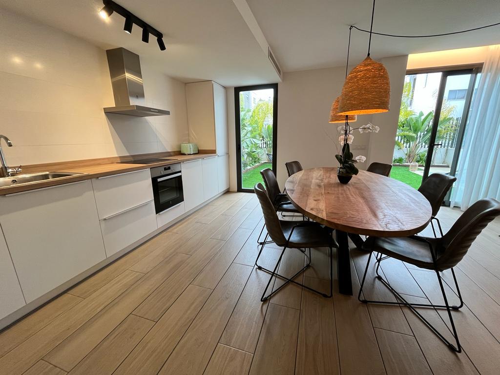 Resa estates ibiza sales ground floor apartment pool Ibiza dining area.jpg